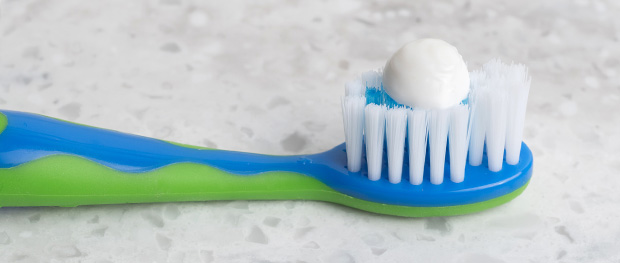 toothbrush with toothpaste applied